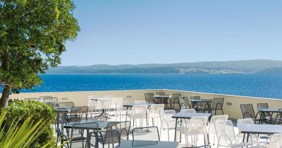 Een foto van het terras bij Holiday Village Sagitta