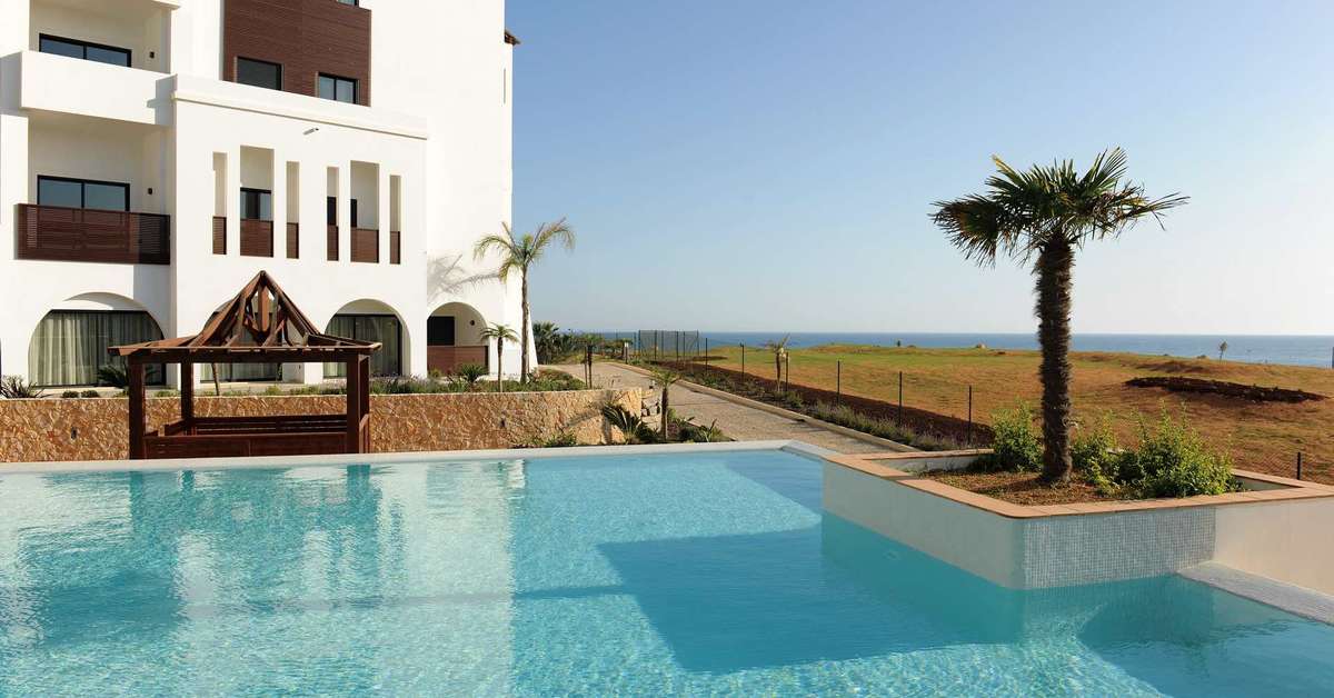 Een foto van het zwembad bij Belmar Spa & Beach Resort