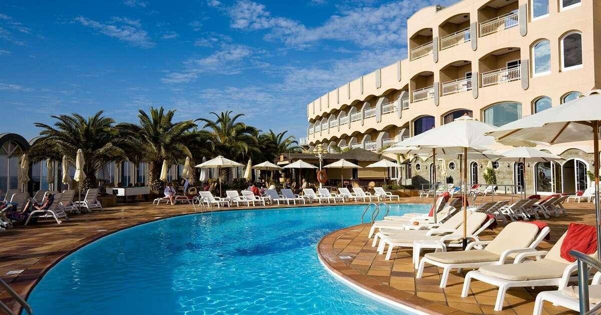 Een foto van het zwembad bij San Agustin Beach Club Hotel