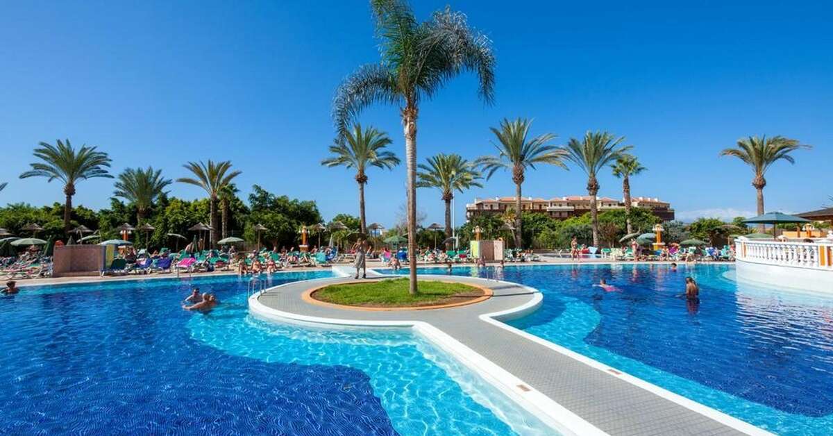 Een foto van het zwembad bij Chatur Playa Real Resort
