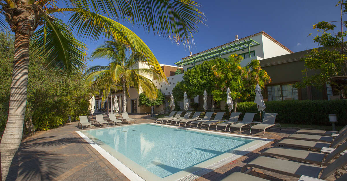 Een foto van het zwembad bij Lopesan Villa del Conde