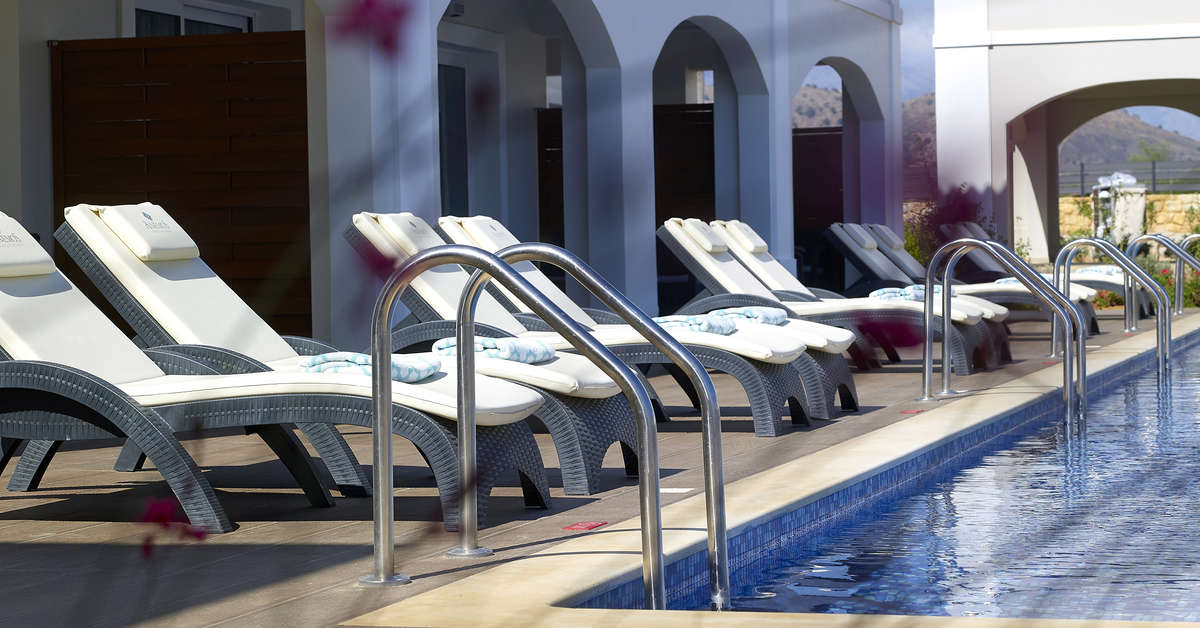 Een foto van het zwembad bij Anemos Luxury Grand Resort