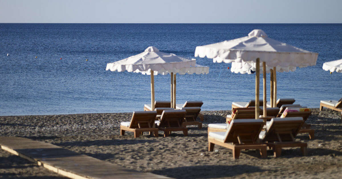 Een foto van het strand bij Mitsis Alila Exclusive Resort & Spa