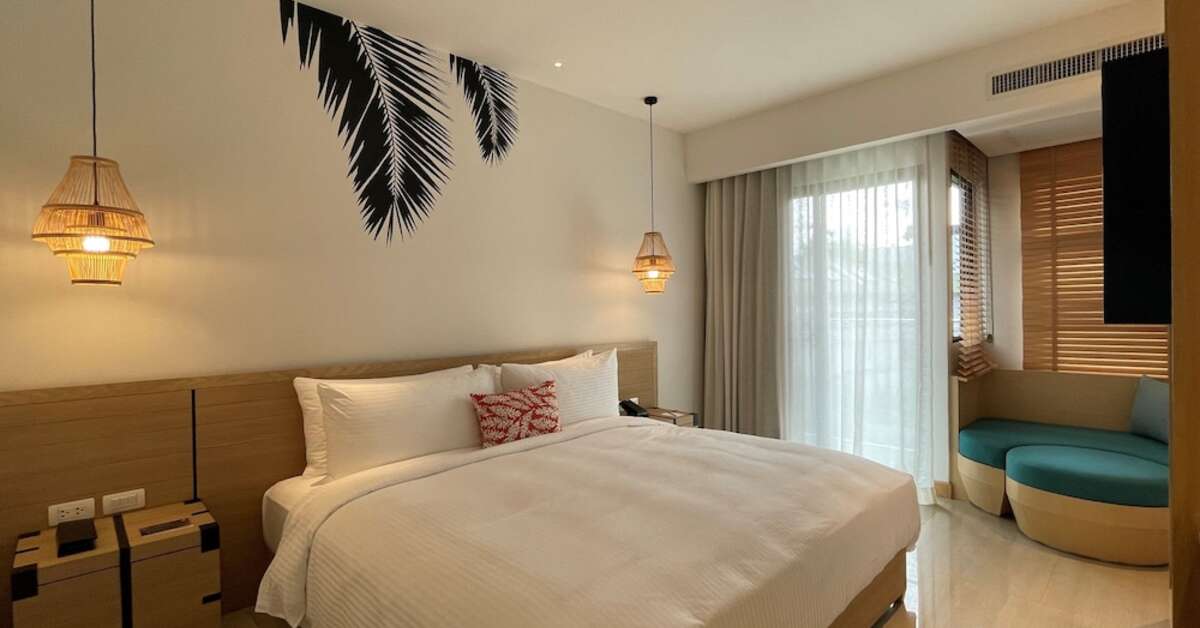 Ein Foto Outrigger Surin Beach Resort