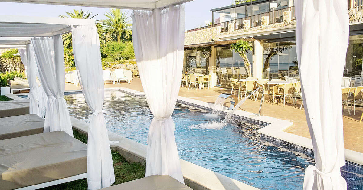Een foto van het zwembad bij Pierre & Vacances Premium Menorca Binibeca