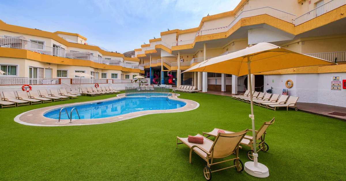 Een foto van het zwembad bij Checkin Bungalows Atlantida