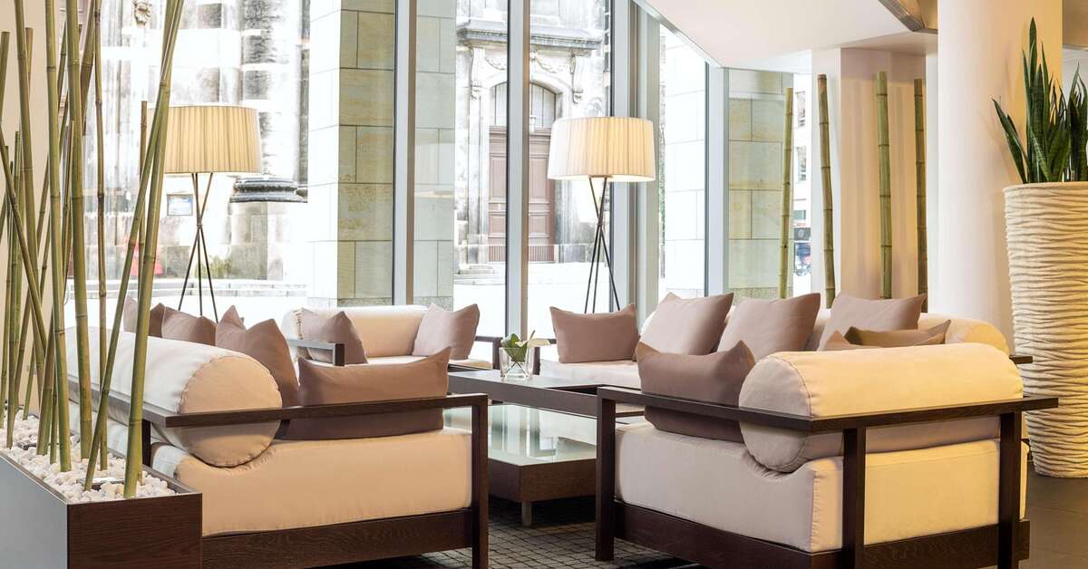 Een foto van het interieur van NH Collection Dresden Altmarkt