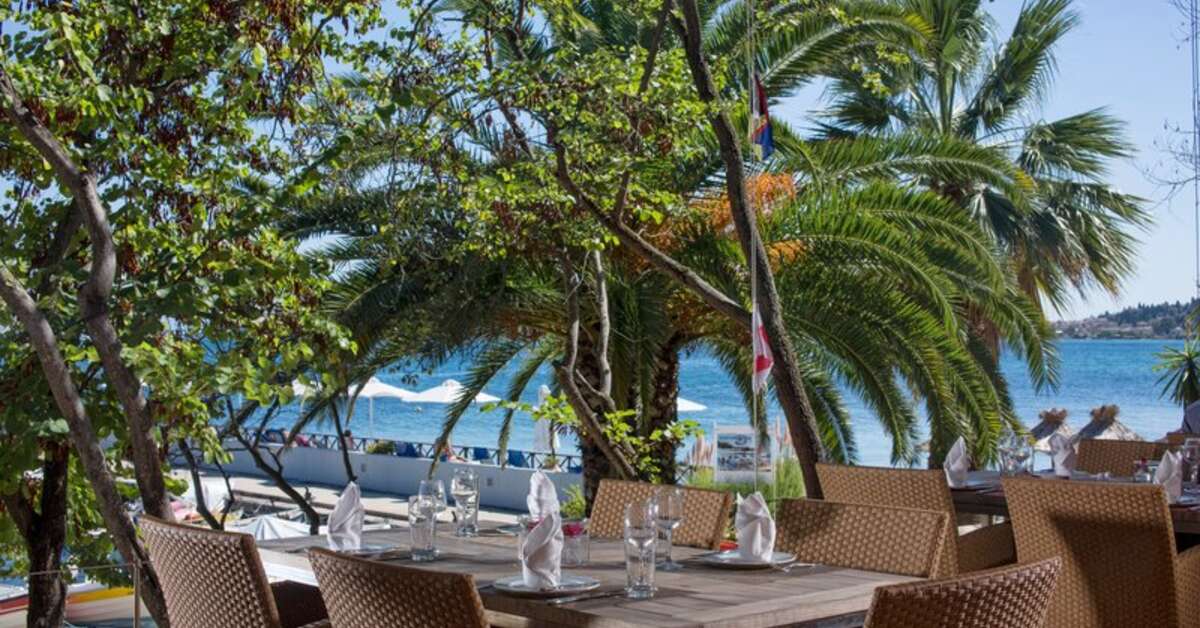 Een foto van het terras bij Kontokali Bay Resort & Spa