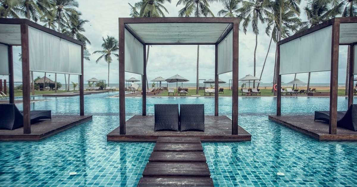 Een foto van het zwembad bij Suriya Luxury Resort