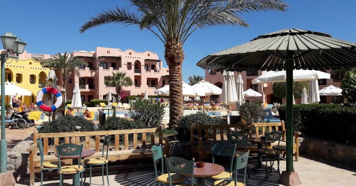Een foto van het terras bij The Three Corners Rihana Inn