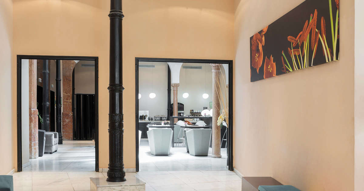 Een foto van het interieur van Petit Palace Plaza Malaga Hotel