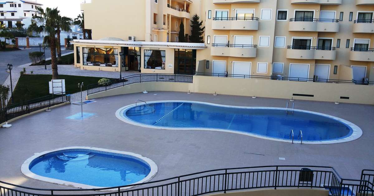 Een foto van het zwembad bij Plaza Real Aparthotel