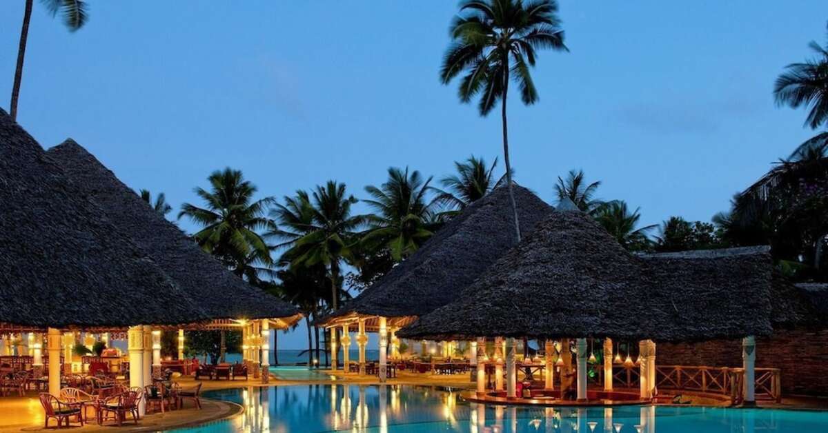 Een foto van het zwembad bij Neptune Village Beach Resort & Spa