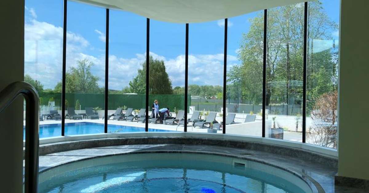 Een foto van het zwembad bij Unique Resort & Spa
