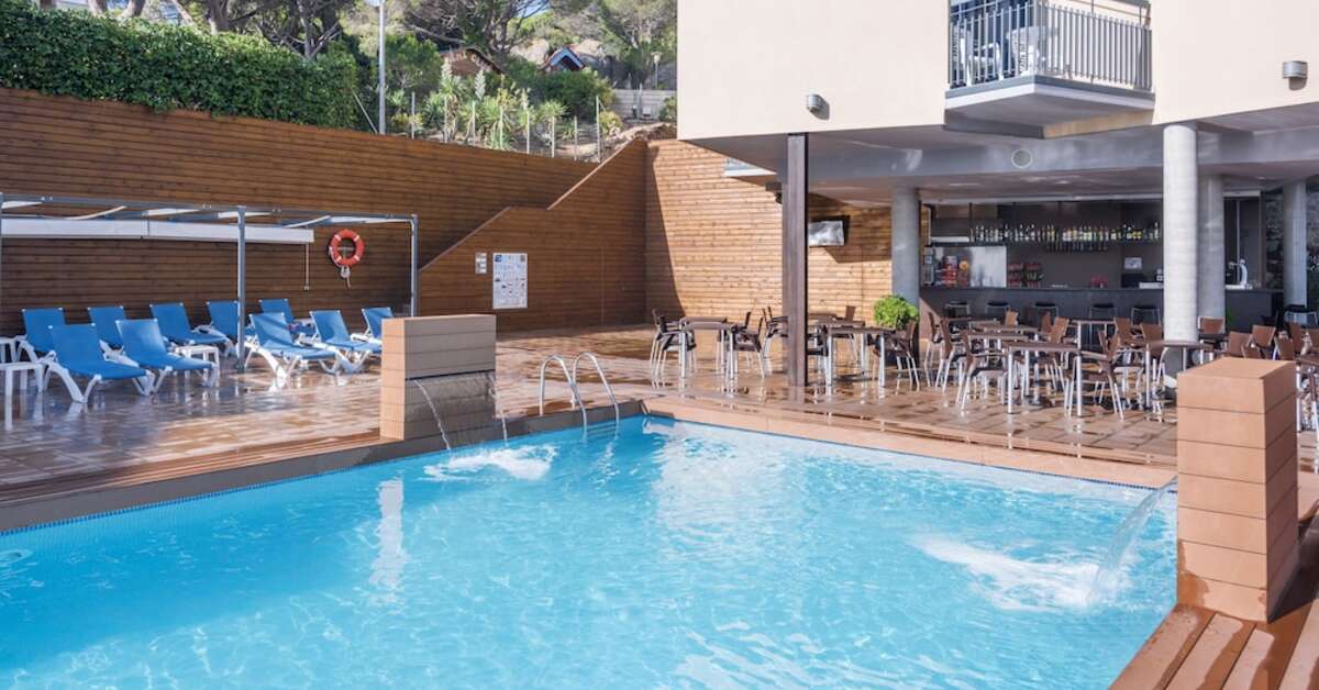 Een foto van het zwembad bij Hotel GHT S'Agaro Mar