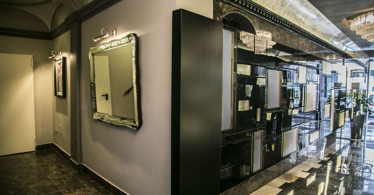 Een foto van het interieur van Rome Style Hotel