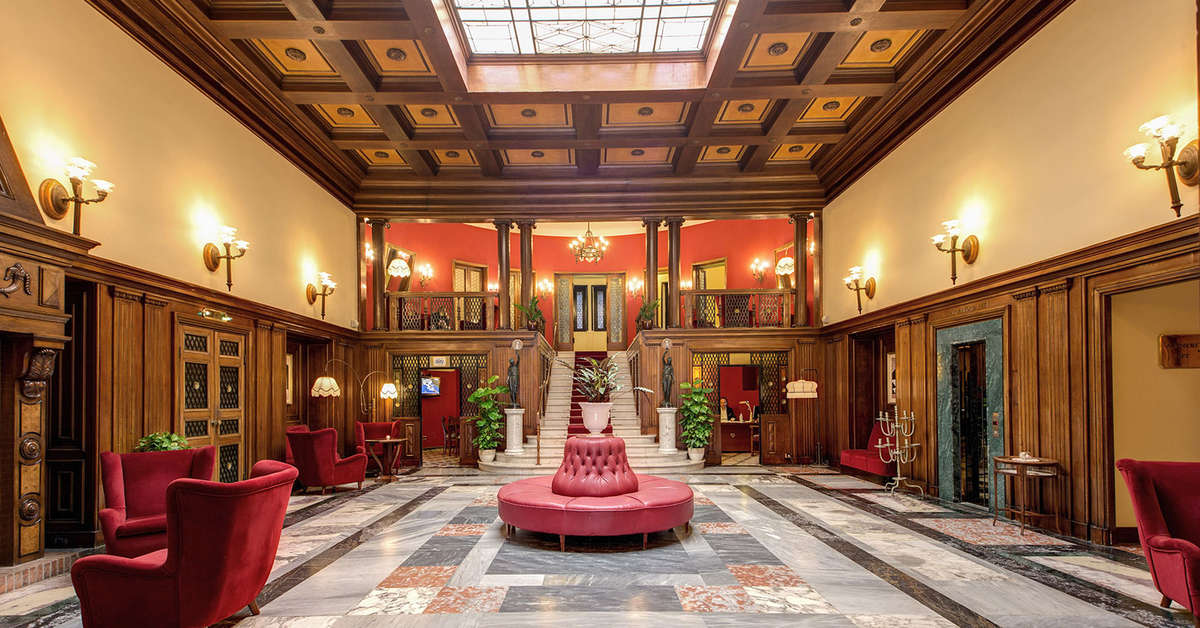 Een foto van het interieur van Grand Hotel Villa Politi
