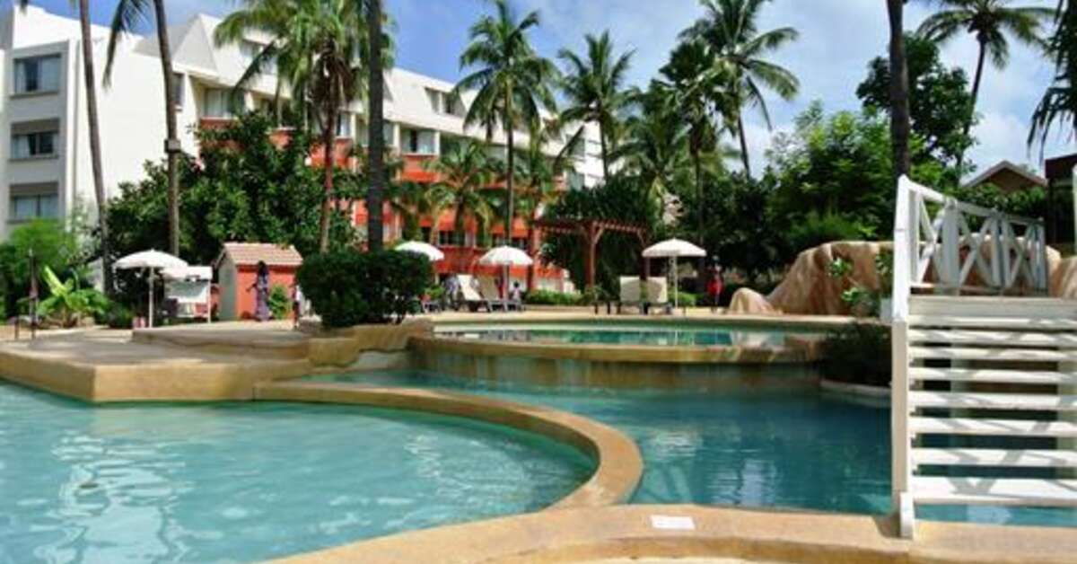 Een foto van het zwembad bij Hotel Palm Beach