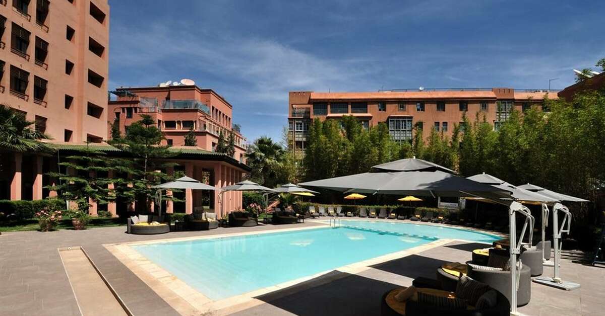 Een foto van het zwembad bij Hotel Novotel Marrakech Hivernage