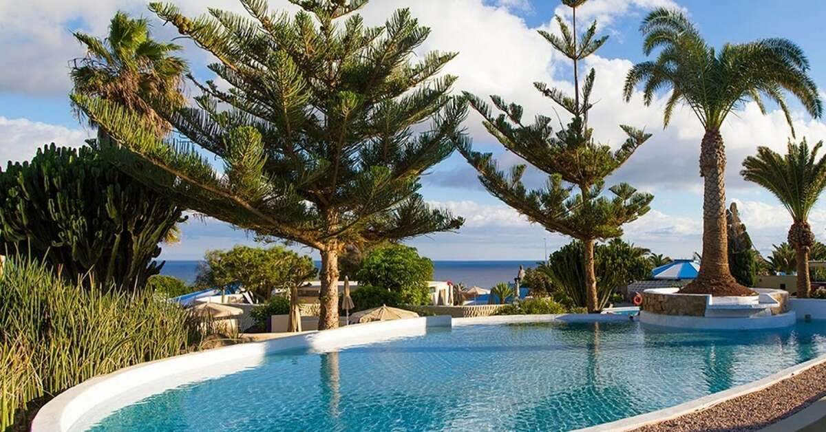 Een foto van het zwembad bij Hotel Livvo Risco del Gato Suites