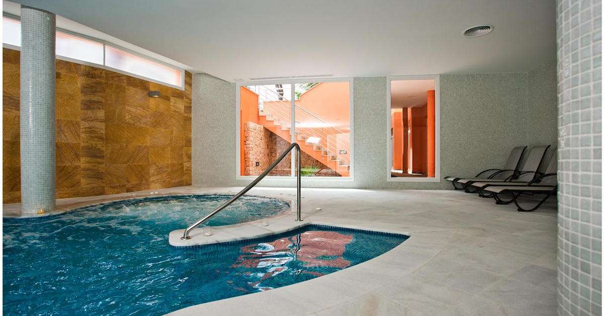 Een foto van het zwembad bij Hotel Spa Sagitario Playa