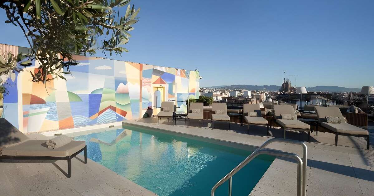 Een foto van het zwembad bij Majestic Hotel & Spa Barcelona
