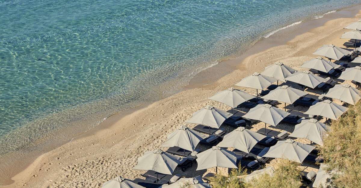 Een foto van het strand bij Myconian Villa Collection