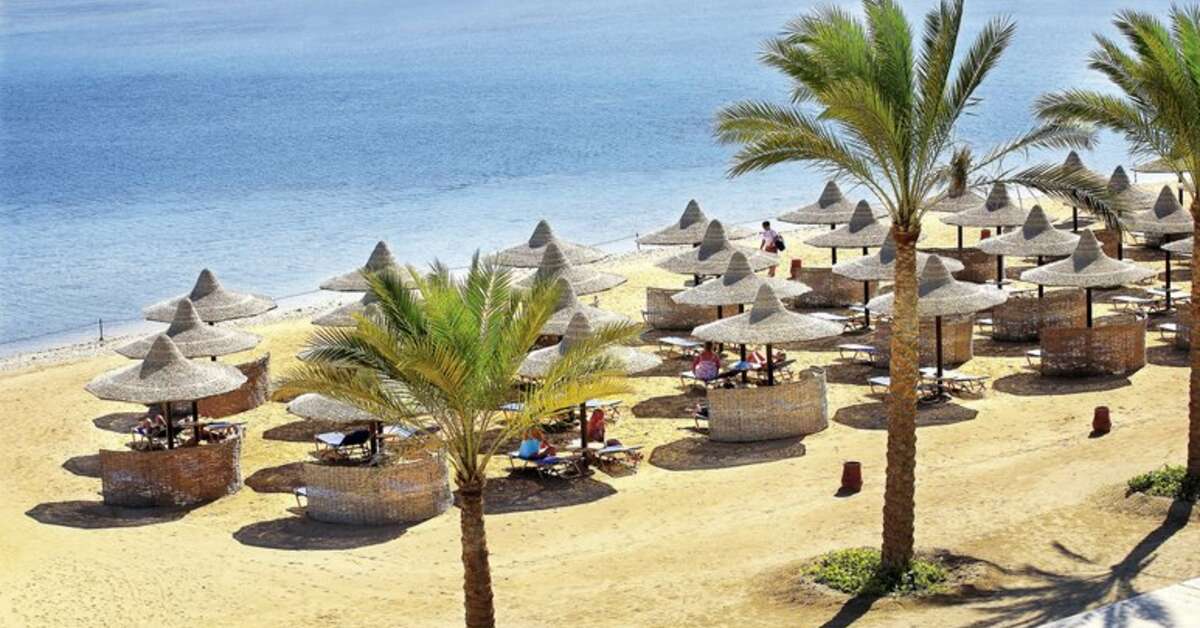 Een foto van het strand bij Jaz Dar El Madina