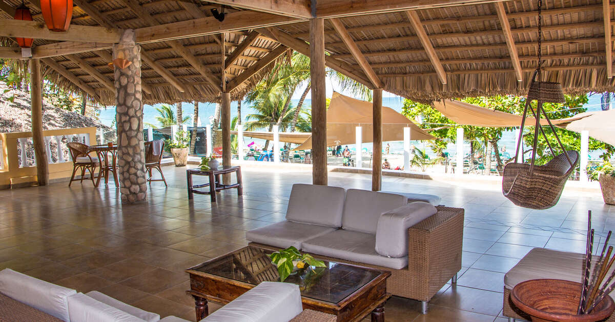 Een foto van het terras bij Villa Taina