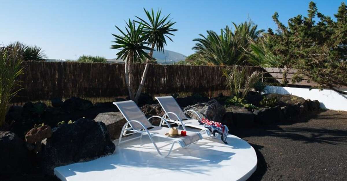 Een foto van het terras bij Hotel El Grifo