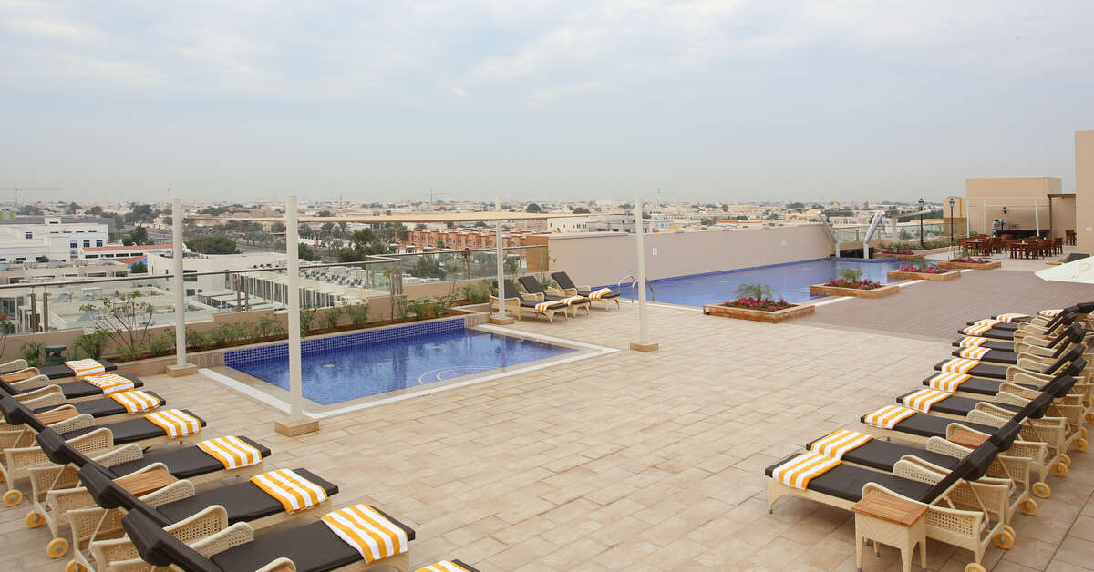 Een foto van het zwembad bij Metropolitan Hotel Dubai