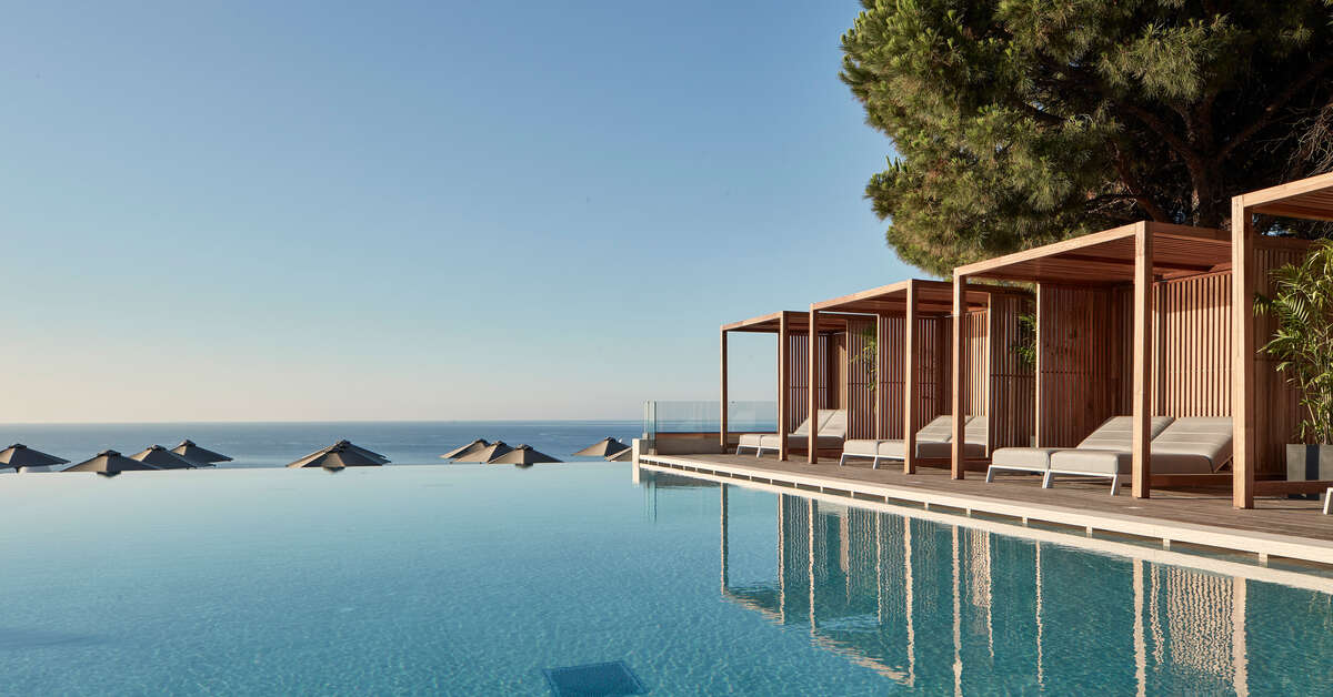 Ein Foto vom Pool im Esperos Village Blue & Spa