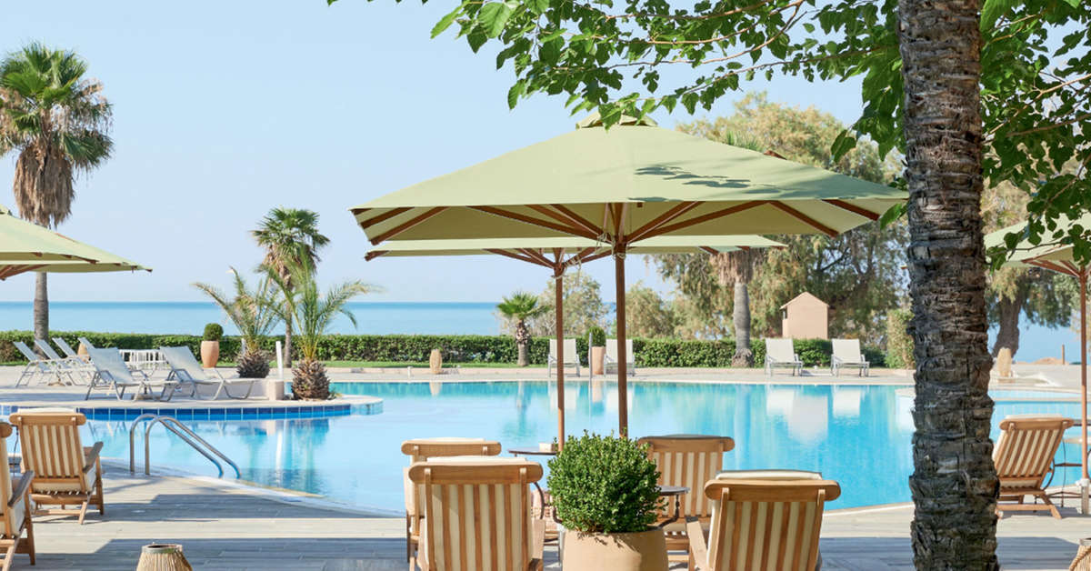 Ein Foto vom Pool im Grecotel Plaza Beach House