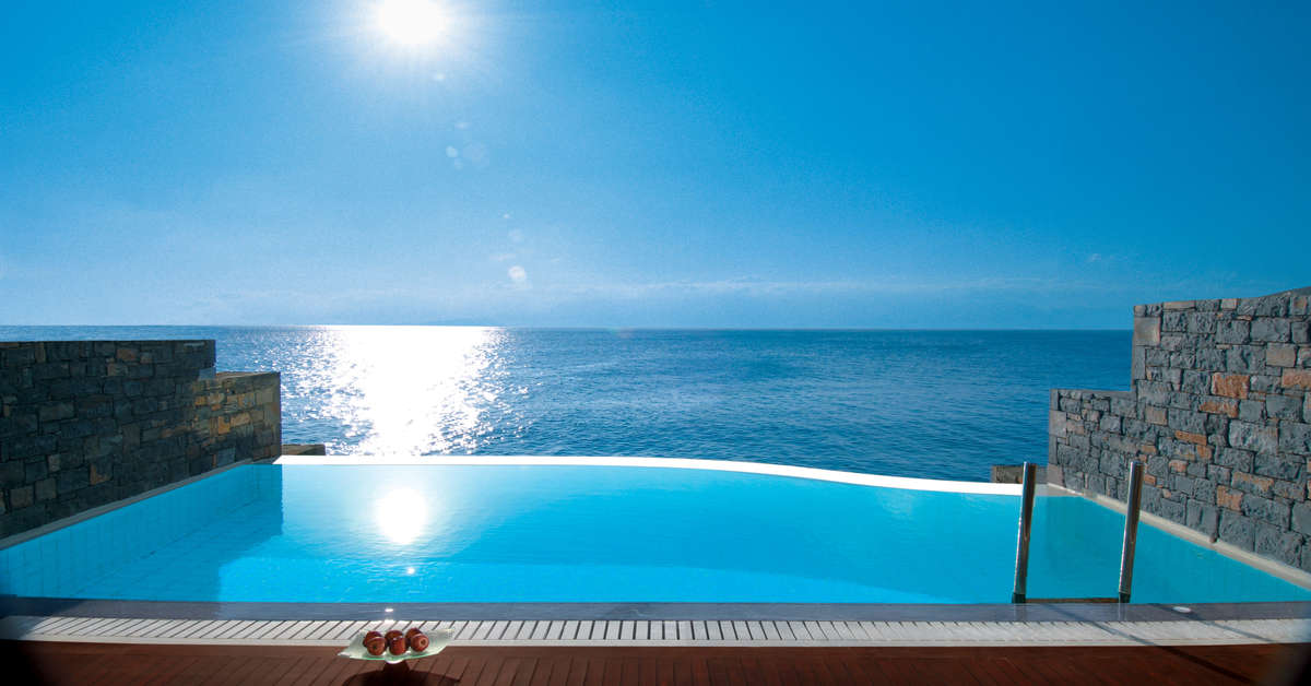 Een foto van het zwembad bij Elounda Beach Hotel & Villas