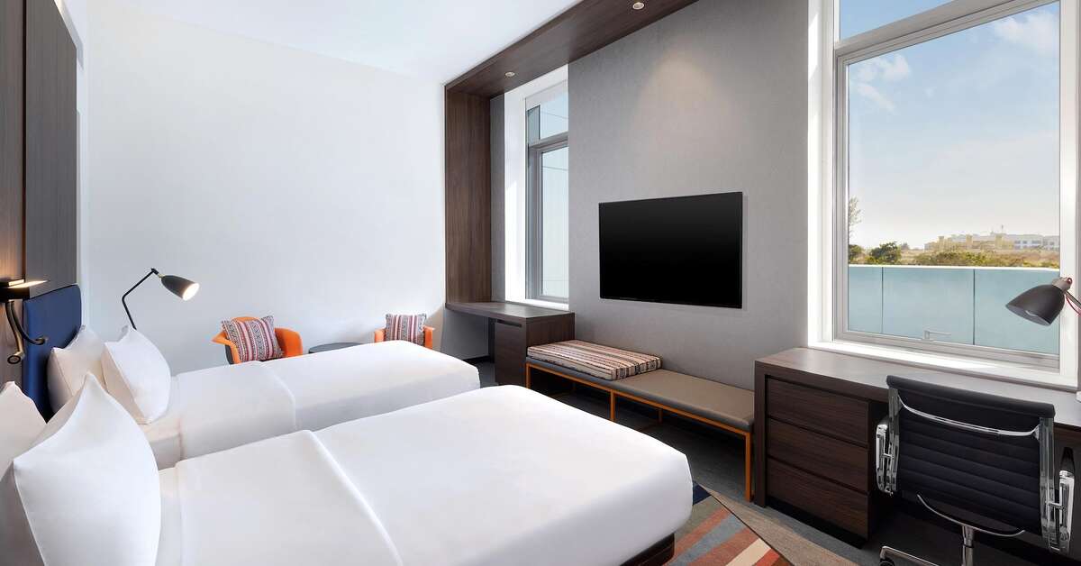 Ein Foto Aloft Al Mina Hotel