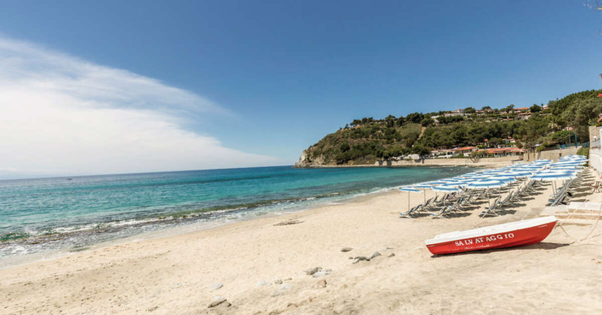 Een foto van het strand bij Villaggio Baia d'Ercole