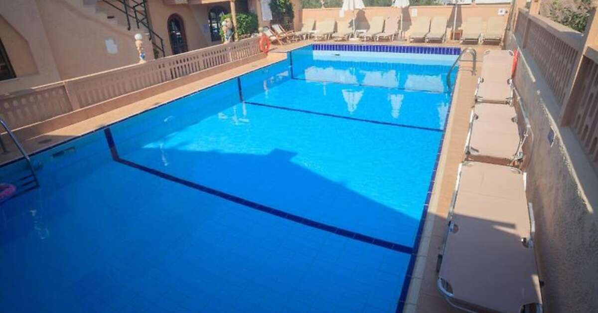 Ein Foto Evina Rooms & Villas