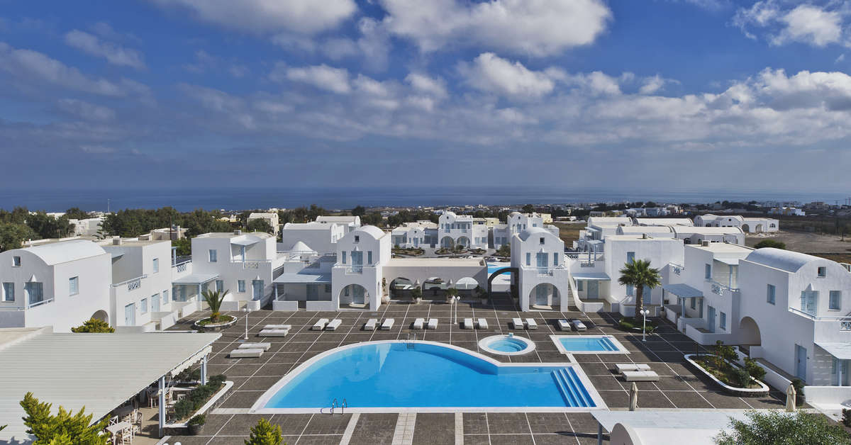 Een foto van het zwembad bij El Greco Resort & Spa