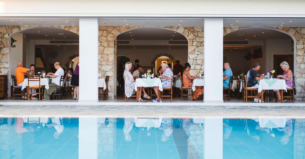 Een foto van het zwembad bij Hotel Mimosa Beach