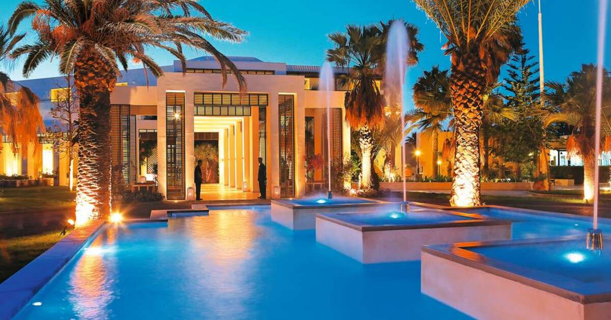 Een foto van het zwembad bij Grecotel Creta Palace