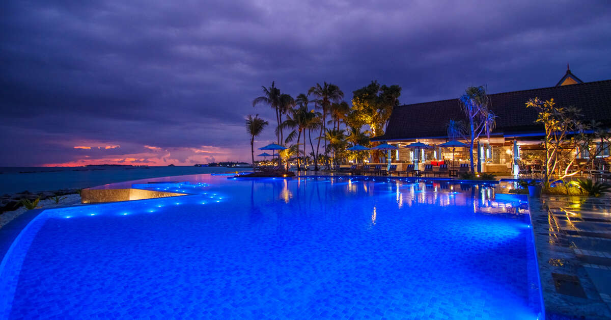 Een foto van het zwembad bij Saii Lagoon Maldives Curio Collection by Hilton