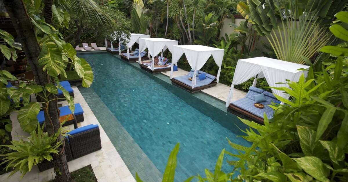 Een foto van het zwembad bij The Elysian Boutique Villa Resort