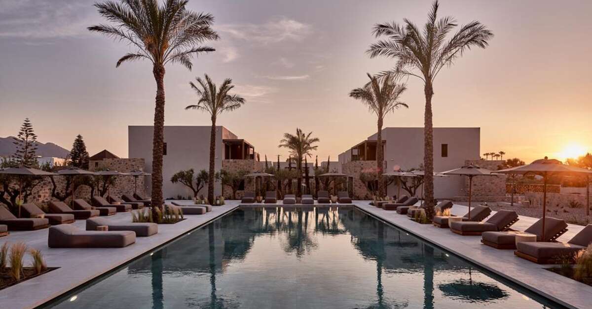 Een foto van het zwembad bij Theros All Suite Hotel