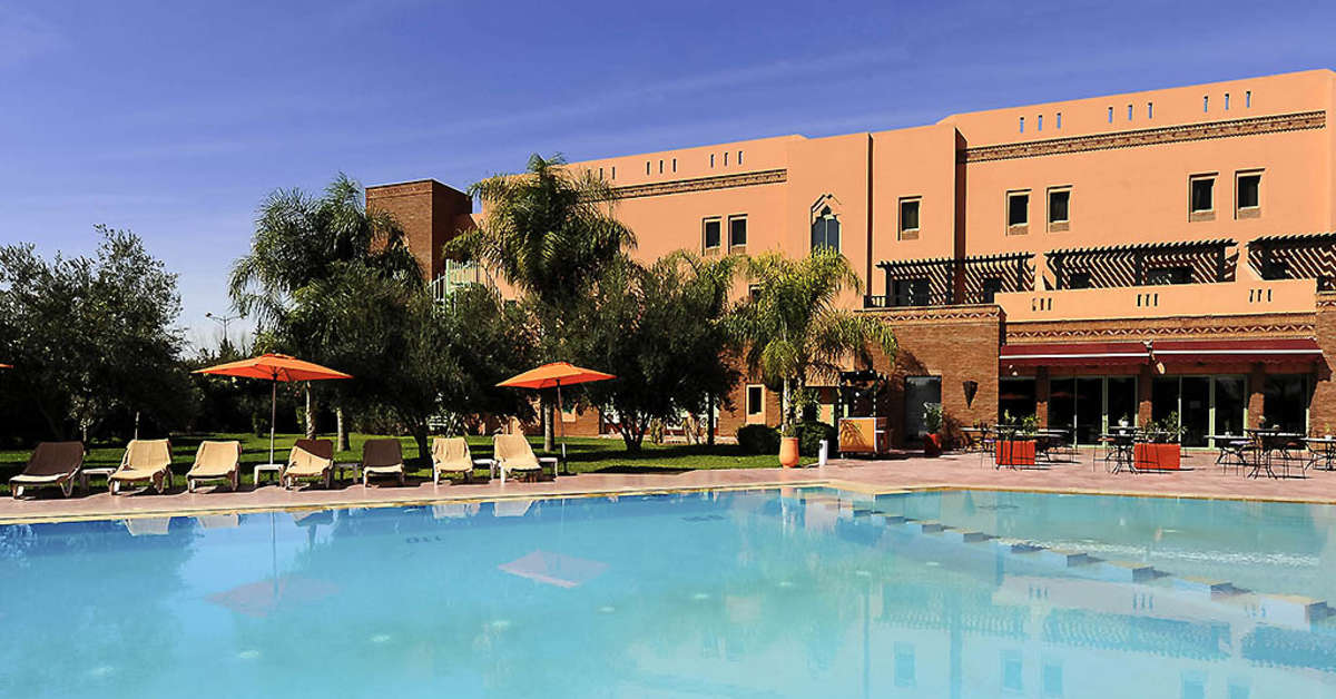 Een foto van het zwembad bij Ibis Marrakech Palmeraie