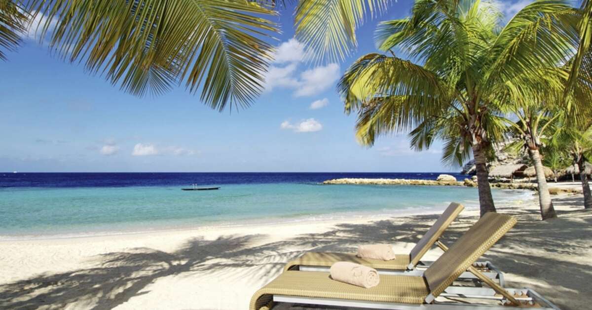 Een foto van het strand bij Blue Bay Golf & Beach Resort