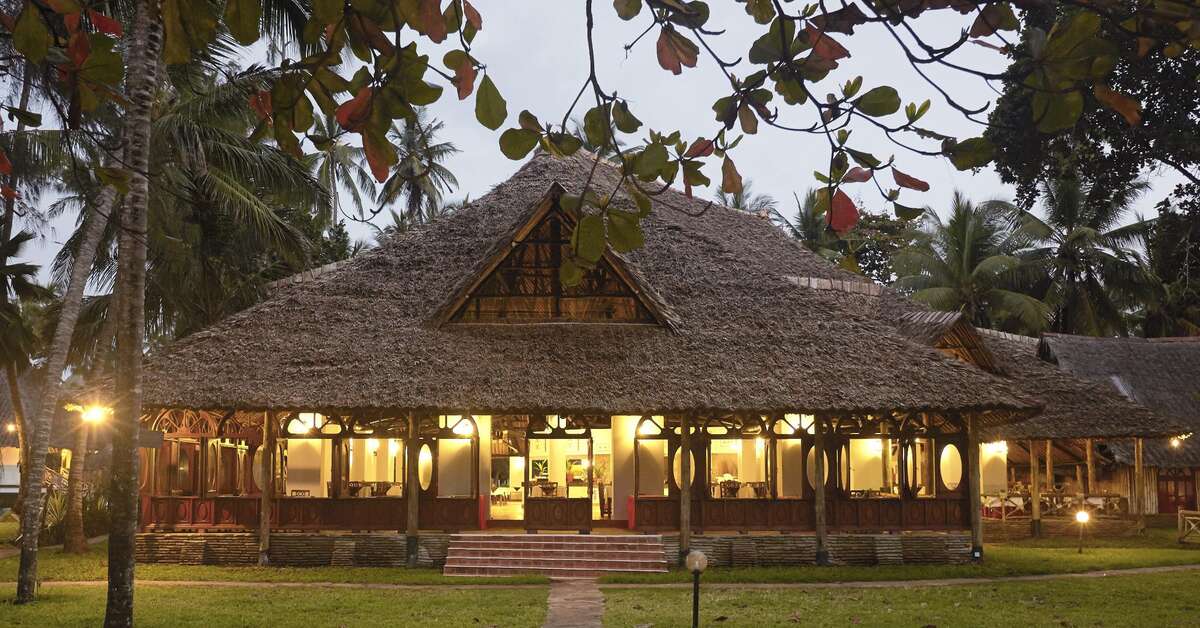 Een foto van de buitenkant van Neptune Village Beach Resort & Spa