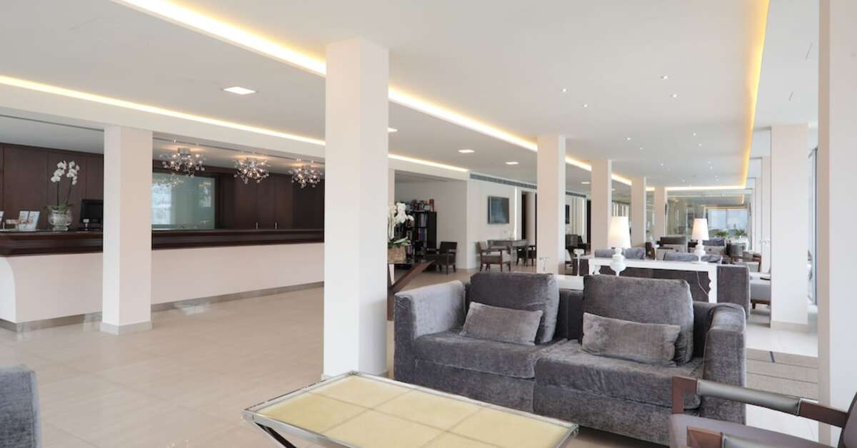 Een foto van het interieur van La Pergola Aparthotel