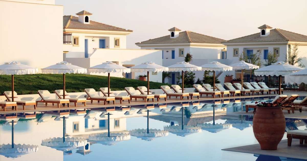 Een foto van het zwembad bij Mitsis Laguna Resort & Spa