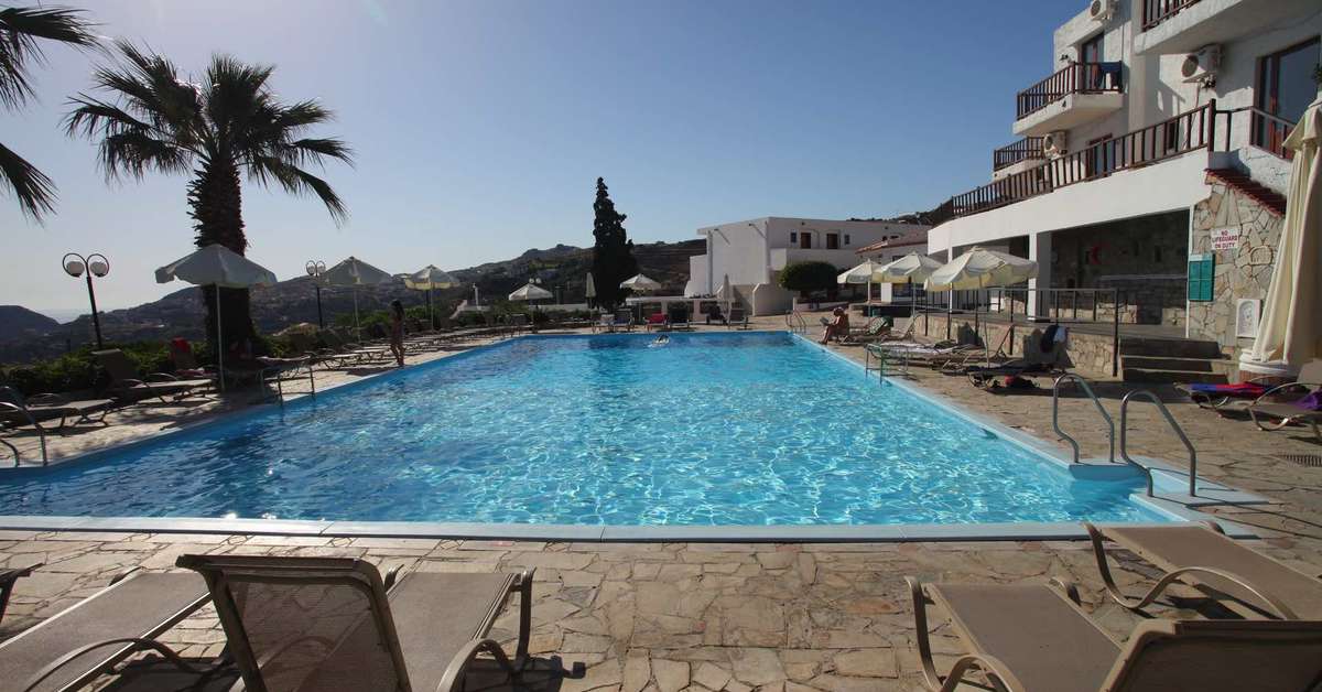 Een foto van het zwembad bij Panorama Village & Hotel