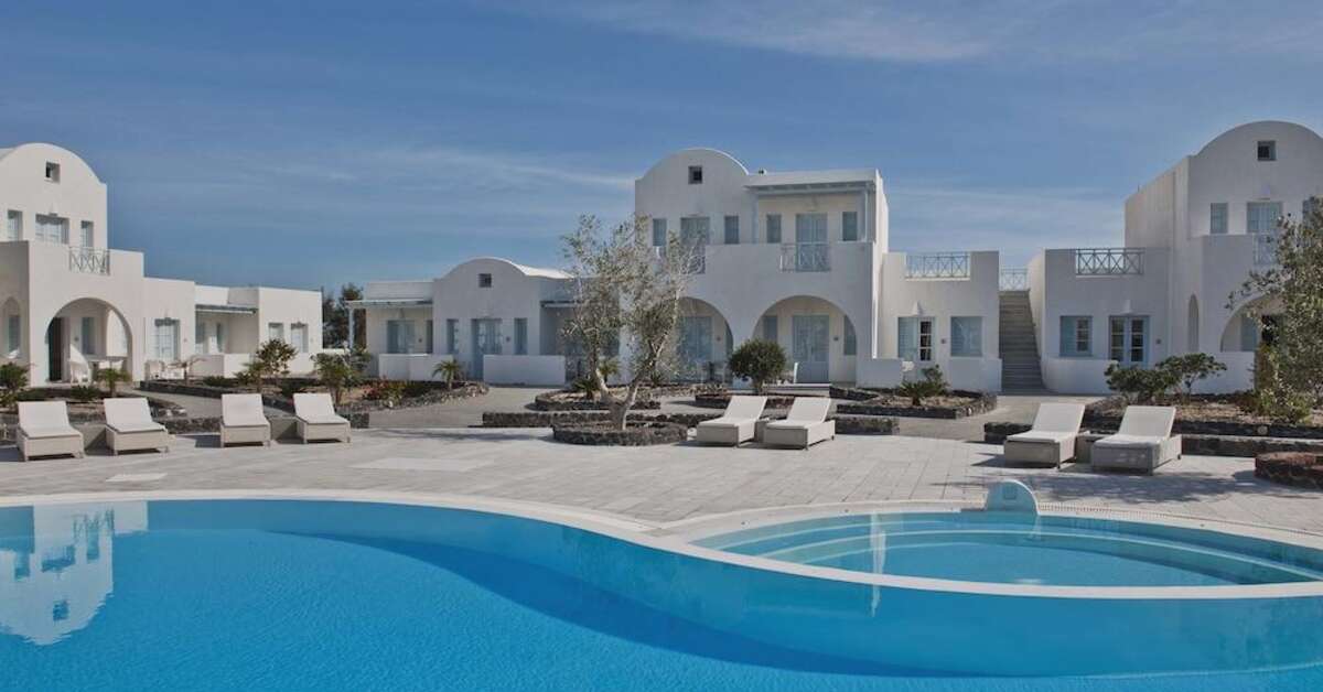 Een foto van het zwembad bij El Greco Resort & Spa